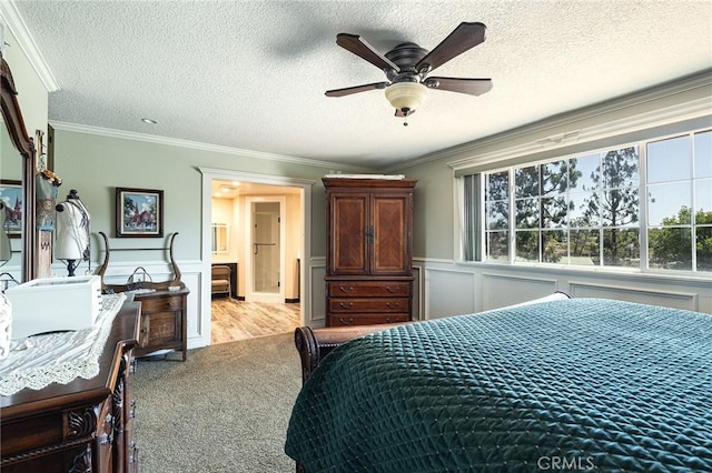 469 Grinnel Ct, Simi Valley, CA 93065 - bedroom featuring crown molding, a textured ceiling, multiple windows, a wainscoted wall, and carpet floors