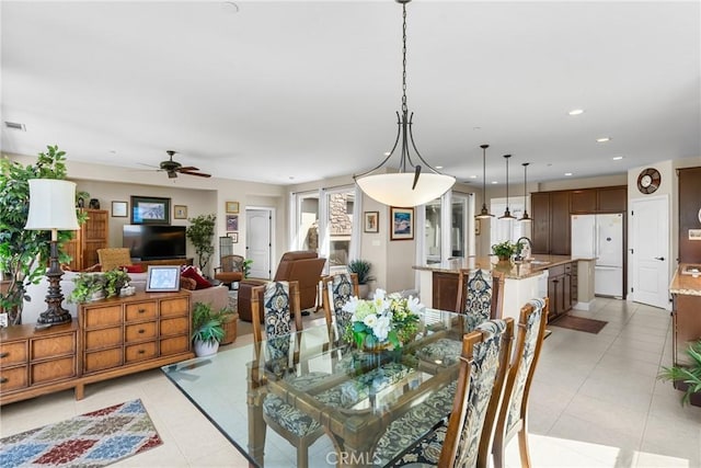 905 Romneya Ln, Santa Maria, CA 93455 - dining space with light tile patterned floors, ceiling fan, and recessed lighting