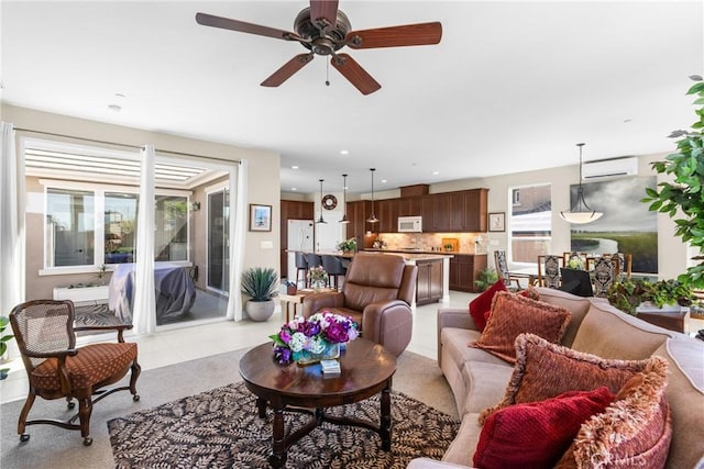 905 Romneya Ln, Santa Maria, CA 93455 - living area featuring an AC wall unit, a ceiling fan, and recessed lighting