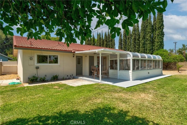 1525 E Baldwin Ave, Orange, CA 92865 - rear view of property with a sunroom, a tiled roof, a patio area, and stucco siding