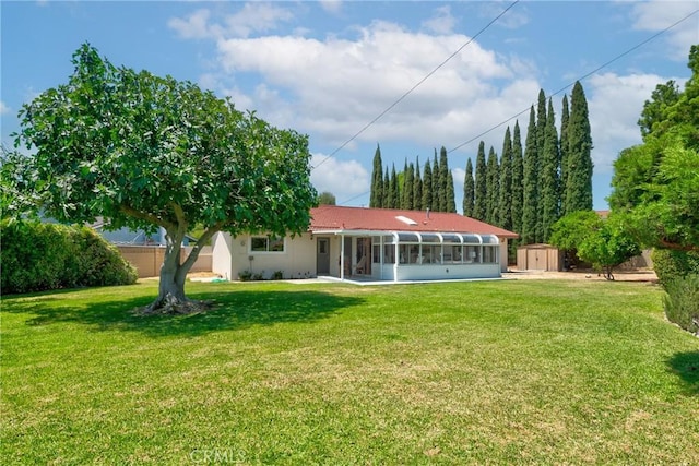 1525 E Baldwin Ave, Orange, CA 92865 - back of property featuring a sunroom and a lawn