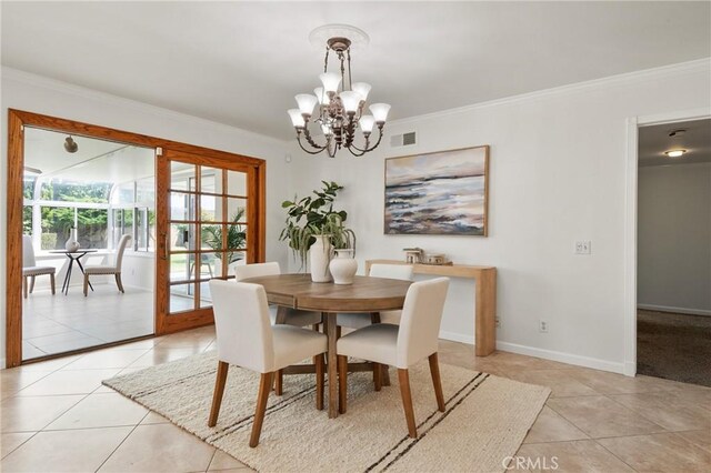 1525 E Baldwin Ave, Orange, CA 92865 - dining space featuring light tile patterned floors, ornamental molding, a chandelier, and baseboards