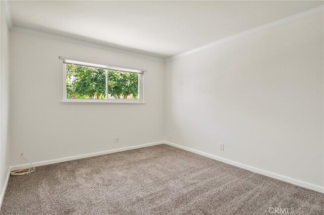 1525 E Baldwin Ave, Orange, CA 92865 - carpeted spare room featuring baseboards and ornamental molding
