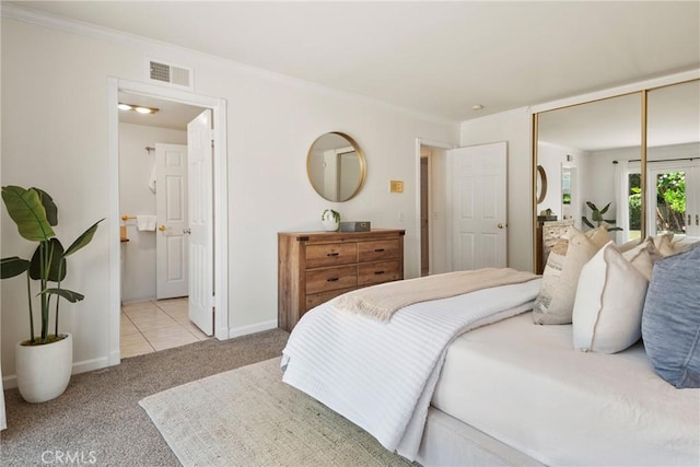 1525 E Baldwin Ave, Orange, CA 92865 - carpeted bedroom featuring baseboards, crown molding, and ensuite bathroom
