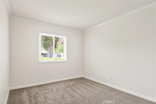1525 E Baldwin Ave, Orange, CA 92865 - empty room featuring baseboards, ornamental molding, and carpet floors