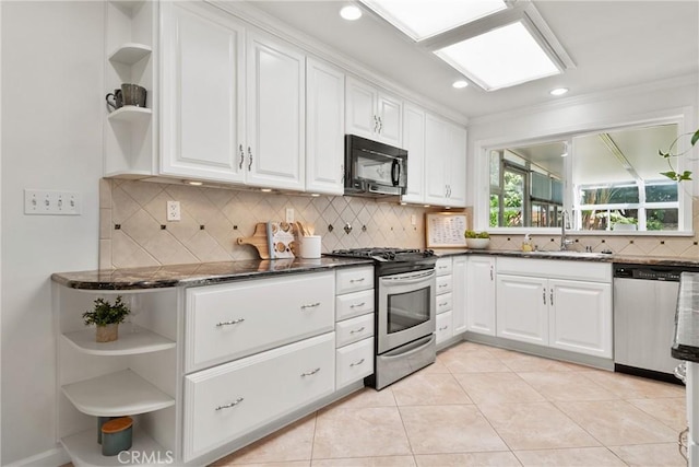 1525 E Baldwin Ave, Orange, CA 92865 - kitchen featuring open shelves, stainless steel appliances, a sink, white cabinets, and recessed lighting