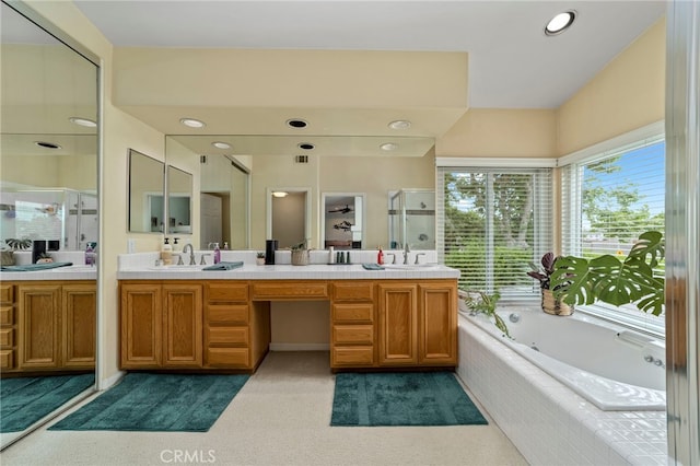 823 Sonora Ct, San Dimas, CA 91773 - full bathroom featuring double vanity, a jetted tub, a stall shower, and recessed lighting