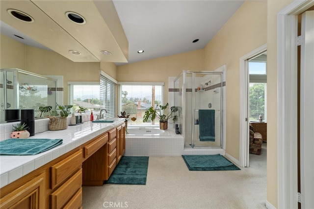 823 Sonora Ct, San Dimas, CA 91773 - full bath featuring a shower stall, plenty of natural light, a garden tub, vanity, and lofted ceiling