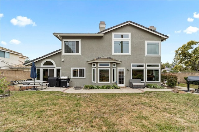 823 Sonora Ct, San Dimas, CA 91773 - rear view of house with a chimney, a patio, and stucco siding
