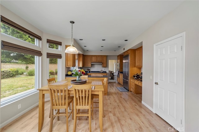 823 Sonora Ct, San Dimas, CA 91773 - dining area with baseboards and light wood-style flooring