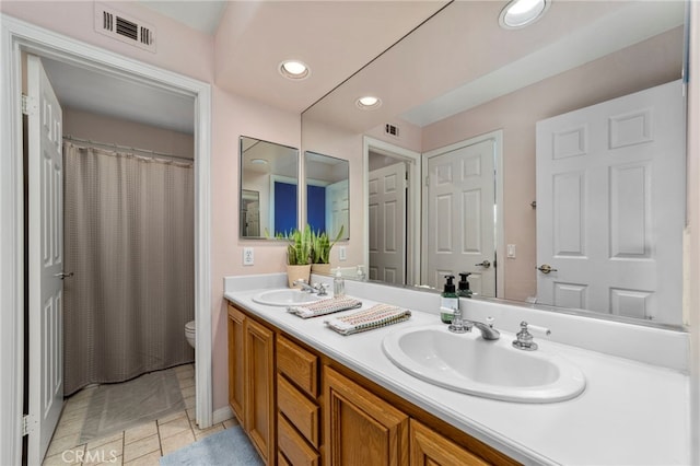 823 Sonora Ct, San Dimas, CA 91773 - full bath with toilet, double vanity, recessed lighting, and a shower with shower curtain