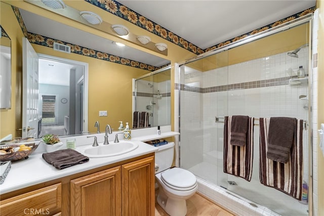 823 Sonora Ct, San Dimas, CA 91773 - bathroom with toilet, vanity, and a shower stall