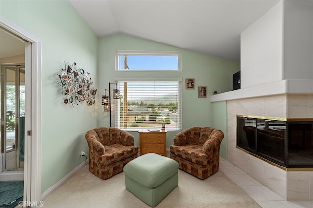 823 Sonora Ct, San Dimas, CA 91773 - living area featuring vaulted ceiling, a tile fireplace, and carpet floors