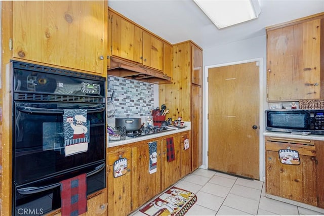 1089 Jadestone Ln, Corona, CA 92882 - kitchen with black appliances, tasteful backsplash, and light countertops
