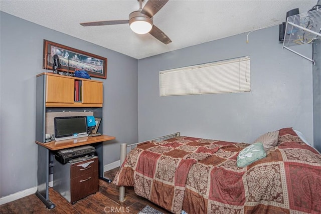 1089 Jadestone Ln, Corona, CA 92882 - bedroom featuring dark wood-type flooring, a textured ceiling, baseboards, and ceiling fan