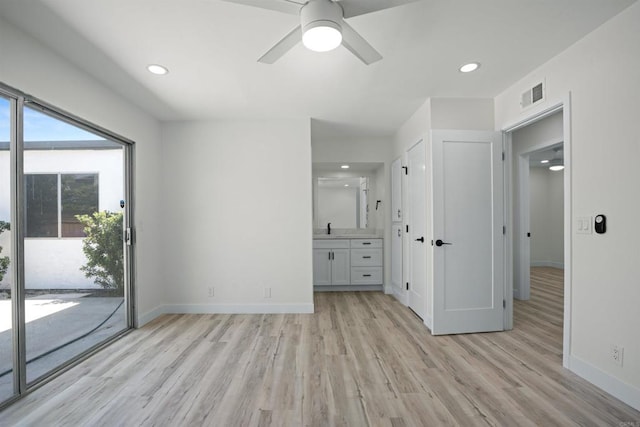 2286 Levante St, Carlsbad, CA 92009 - empty room with light wood-type flooring, a ceiling fan, baseboards, recessed lighting, and a sink
