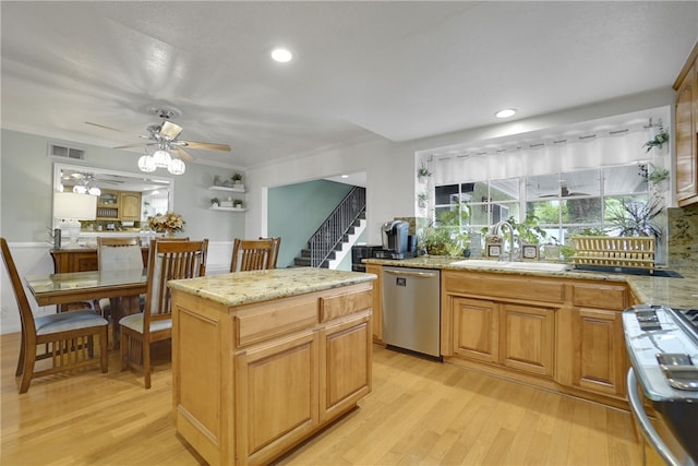 2434 Charlotte Ave, Rosemead, CA 91770 - kitchen featuring appliances with stainless steel finishes, a sink, light wood finished floors, ceiling fan, and light stone counters