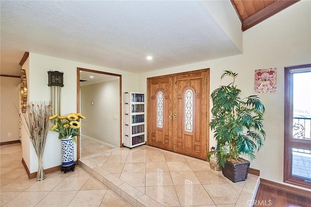 2036 S Buenos Aires Dr, Covina, CA 91724 - entrance foyer featuring baseboards, light tile patterned floors, recessed lighting, and a textured ceiling