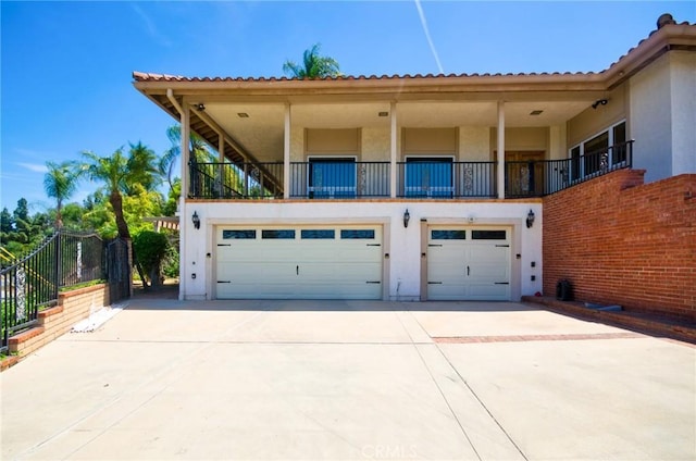 2036 S Buenos Aires Dr, Covina, CA 91724 - view of front of house with an attached garage, stucco siding, and driveway