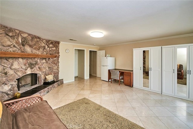 2036 S Buenos Aires Dr, Covina, CA 91724 - unfurnished living room featuring ornamental molding, light tile patterned floors, a fireplace, and baseboards