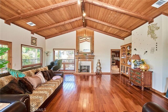 2036 S Buenos Aires Dr, Covina, CA 91724 - living room with a large fireplace, hardwood / wood-style floors, wood ceiling, and baseboards
