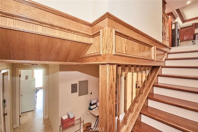 2036 S Buenos Aires Dr, Covina, CA 91724 - stairs with electric panel and tile patterned floors
