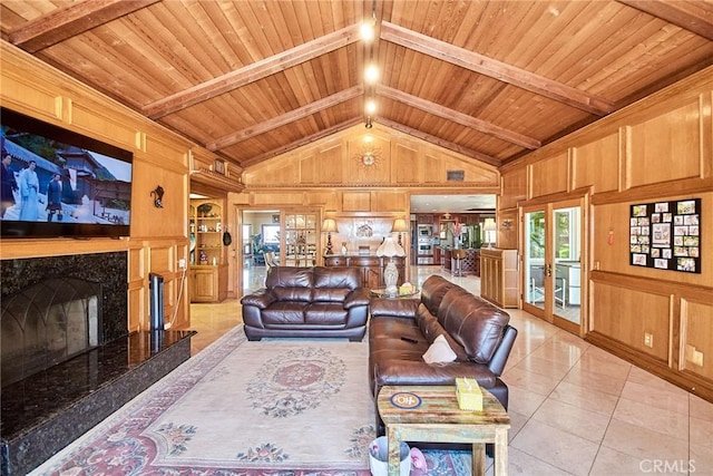 2036 S Buenos Aires Dr, Covina, CA 91724 - living area featuring light tile patterned floors, wood walls, wood ceiling, a fireplace, and built in features