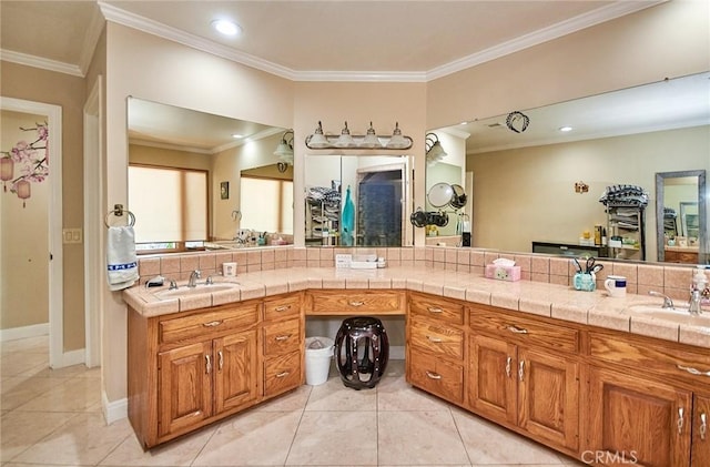 2036 S Buenos Aires Dr, Covina, CA 91724 - bathroom featuring tile patterned floors, backsplash, double vanity, ornamental molding, and recessed lighting