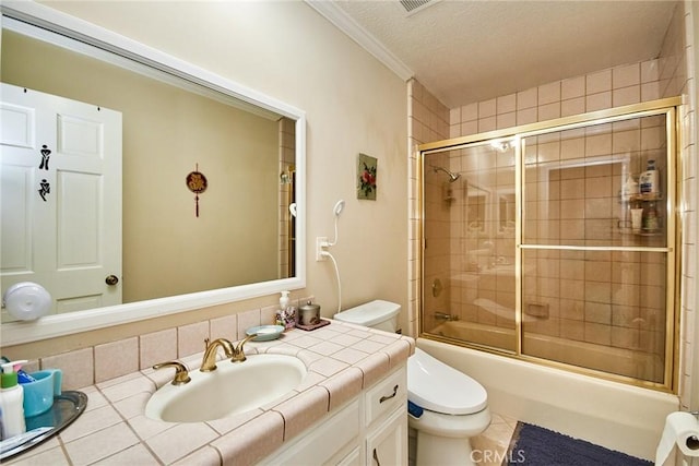 2036 S Buenos Aires Dr, Covina, CA 91724 - full bath featuring toilet, vanity, combined bath / shower with glass door, a textured ceiling, and crown molding
