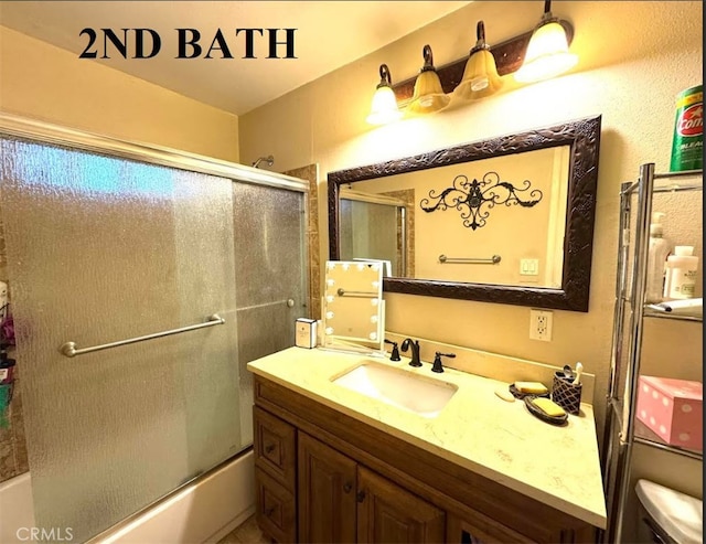 5246 N Clydebank Ave, Azusa, CA 91702 - full bathroom with vanity, shower / bath combination with glass door, and toilet