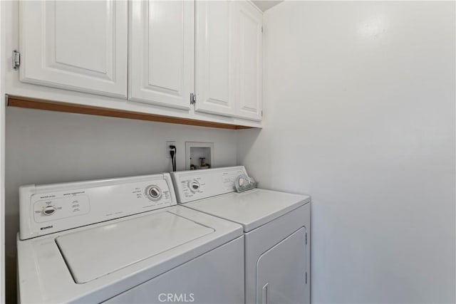 27625 High Knoll Rd, Lake Arrowhead, CA 92352 - laundry room featuring washer and dryer and cabinet space