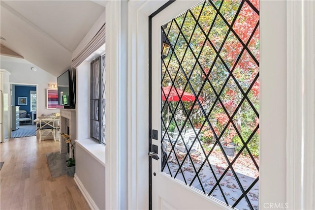 27625 High Knoll Rd, Lake Arrowhead, CA 92352 - doorway to outside featuring lofted ceiling and light wood-style floors