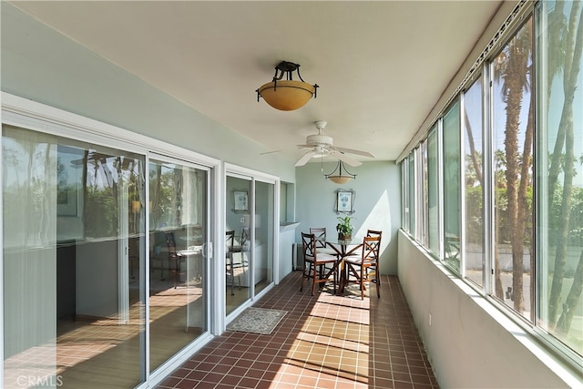277 E Alejo Rd Unit 212, Palm Springs, CA 92262 - sunroom with plenty of natural light, a ceiling fan, and tile patterned floors