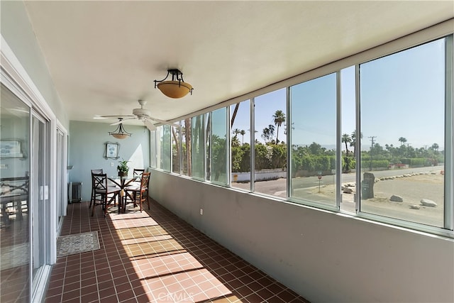 277 E Alejo Rd Unit 212, Palm Springs, CA 92262 - sunroom / solarium with tile patterned floors and a ceiling fan