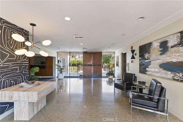 277 E Alejo Rd Unit 212, Palm Springs, CA 92262 - lobby with expansive windows and recessed lighting