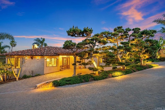 4652 Resmar Rd, La Mesa, CA 91941 - mediterranean / spanish-style home featuring a tiled roof and stucco siding