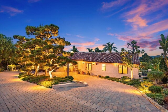 4652 Resmar Rd, La Mesa, CA 91941 - view of front facade with a tile roof and stucco siding