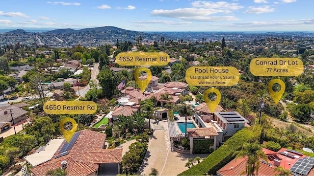 4652 Resmar Rd, La Mesa, CA 91941 - drone / aerial view of a pool area and a mountainous background