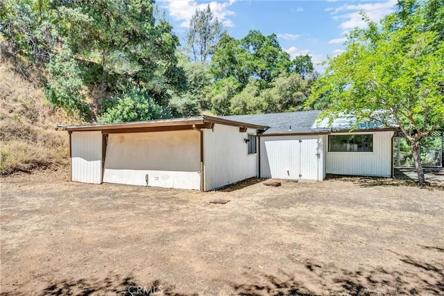 11970 N Dr, Clearlake, CA 95422 - rear view of house featuring an outbuilding