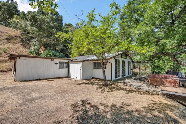 11970 N Dr, Clearlake, CA 95422 - rear view of house with an outdoor structure