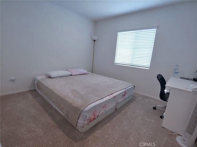 15555 San Diego Ln, Victorville, CA 92394 - bedroom with light carpet, a desk, and baseboards