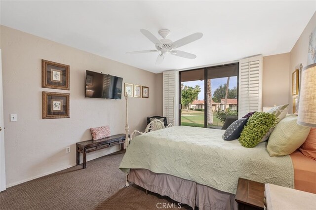 28 Malaga Dr, Rancho Mirage, CA 92270 - carpeted bedroom featuring access to exterior and ceiling fan