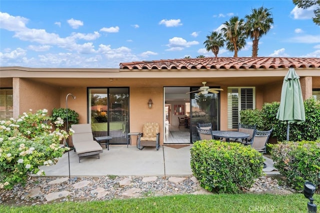 28 Malaga Dr, Rancho Mirage, CA 92270 - back of property featuring stucco siding, ceiling fan, a patio, and a tile roof