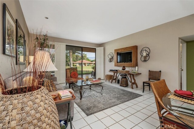 28 Malaga Dr, Rancho Mirage, CA 92270 - living room featuring light tile patterned floors