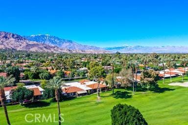 28 Malaga Dr, Rancho Mirage, CA 92270 - surrounding community with a mountain view, view of golf course, a yard, and a residential view
