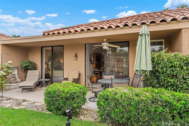 28 Malaga Dr, Rancho Mirage, CA 92270 - back of house with a patio area, stucco siding, and ceiling fan