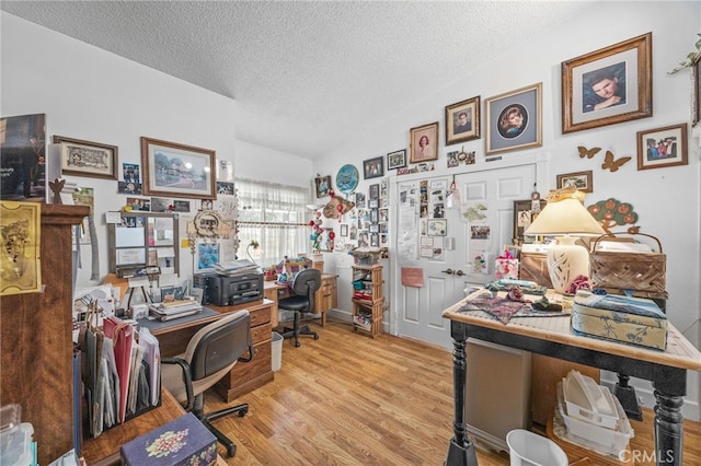 17477 Owl Tree Rd, Riverside, CA 92504 - office area featuring a textured ceiling and wood finished floors