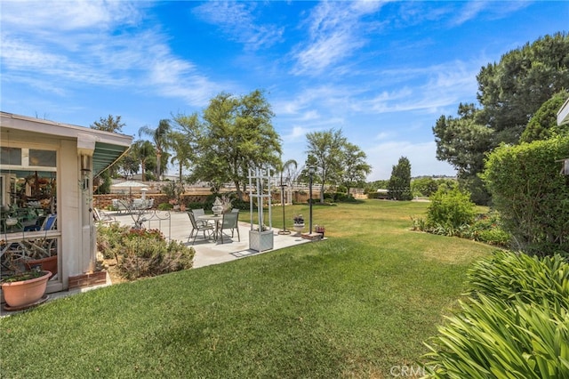 17477 Owl Tree Rd, Riverside, CA 92504 - view of grassy yard with a patio