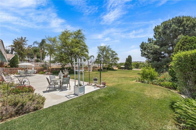 17477 Owl Tree Rd, Riverside, CA 92504 - view of grassy yard featuring a patio area