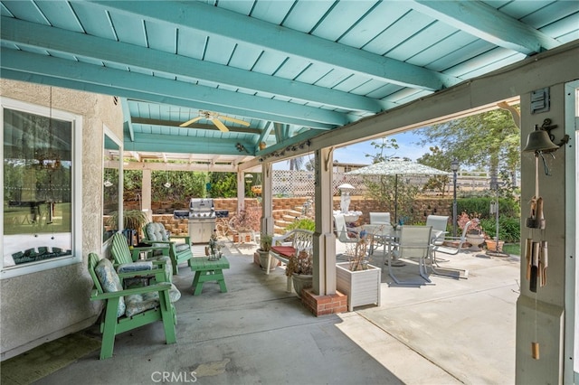 17477 Owl Tree Rd, Riverside, CA 92504 - fenced backyard with outdoor dining area, ceiling fan, and a patio area